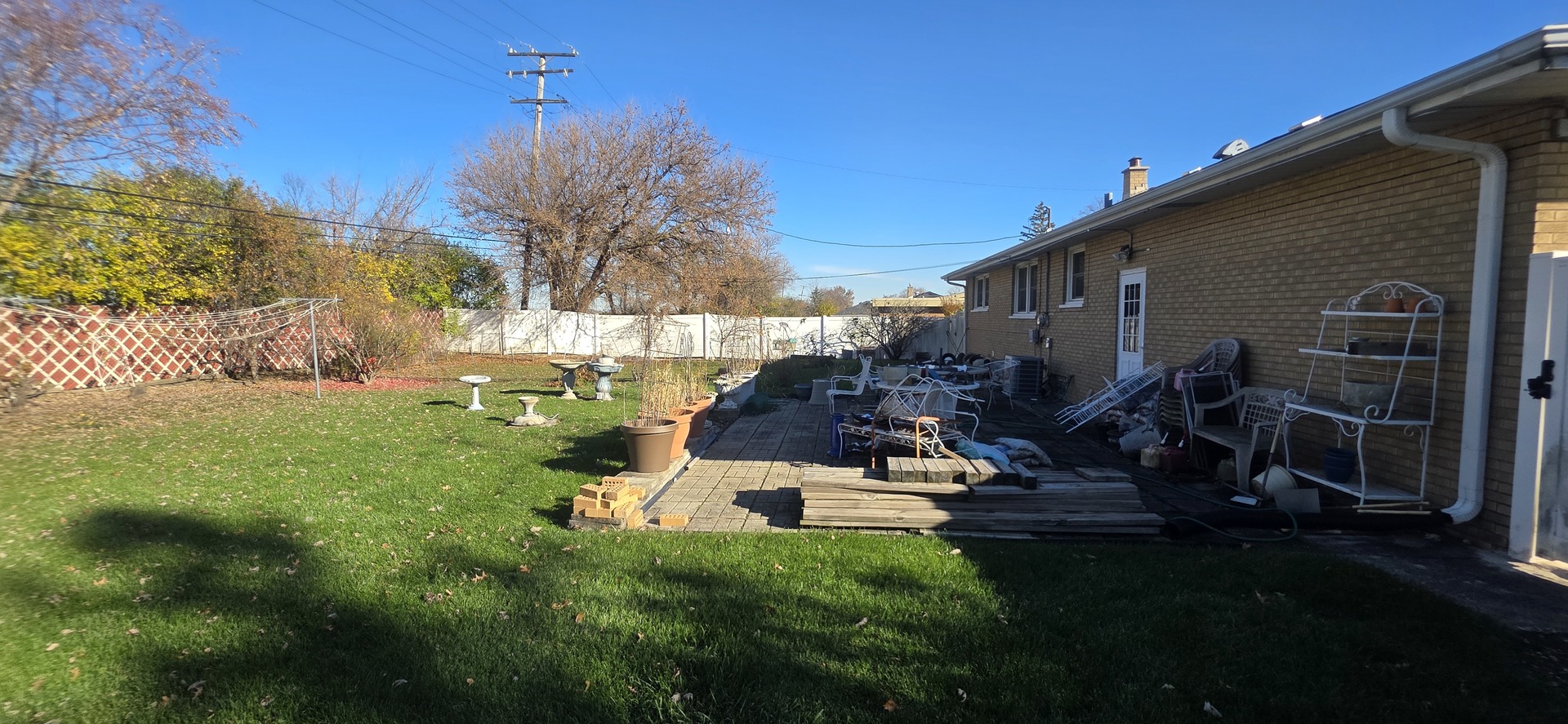 523 8th Street Chicago Heights, IL 60411 - Photo 30 of 31 a view of backyard with plants and outdoor seating