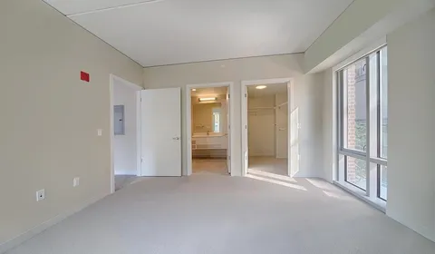 a bathroom with a sink a mirror and a vanity