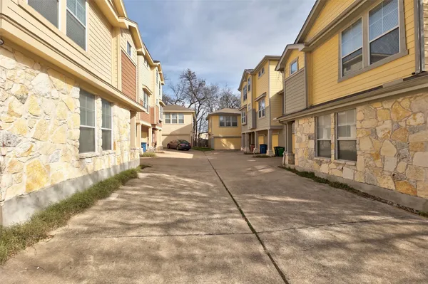 a view of a street with a building