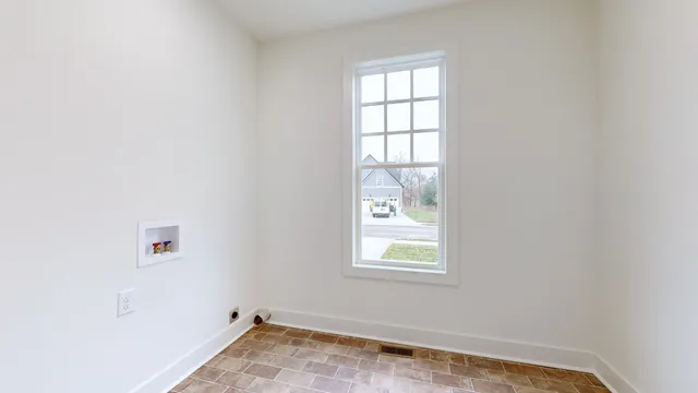 an aerial view of a house with a swimming pool