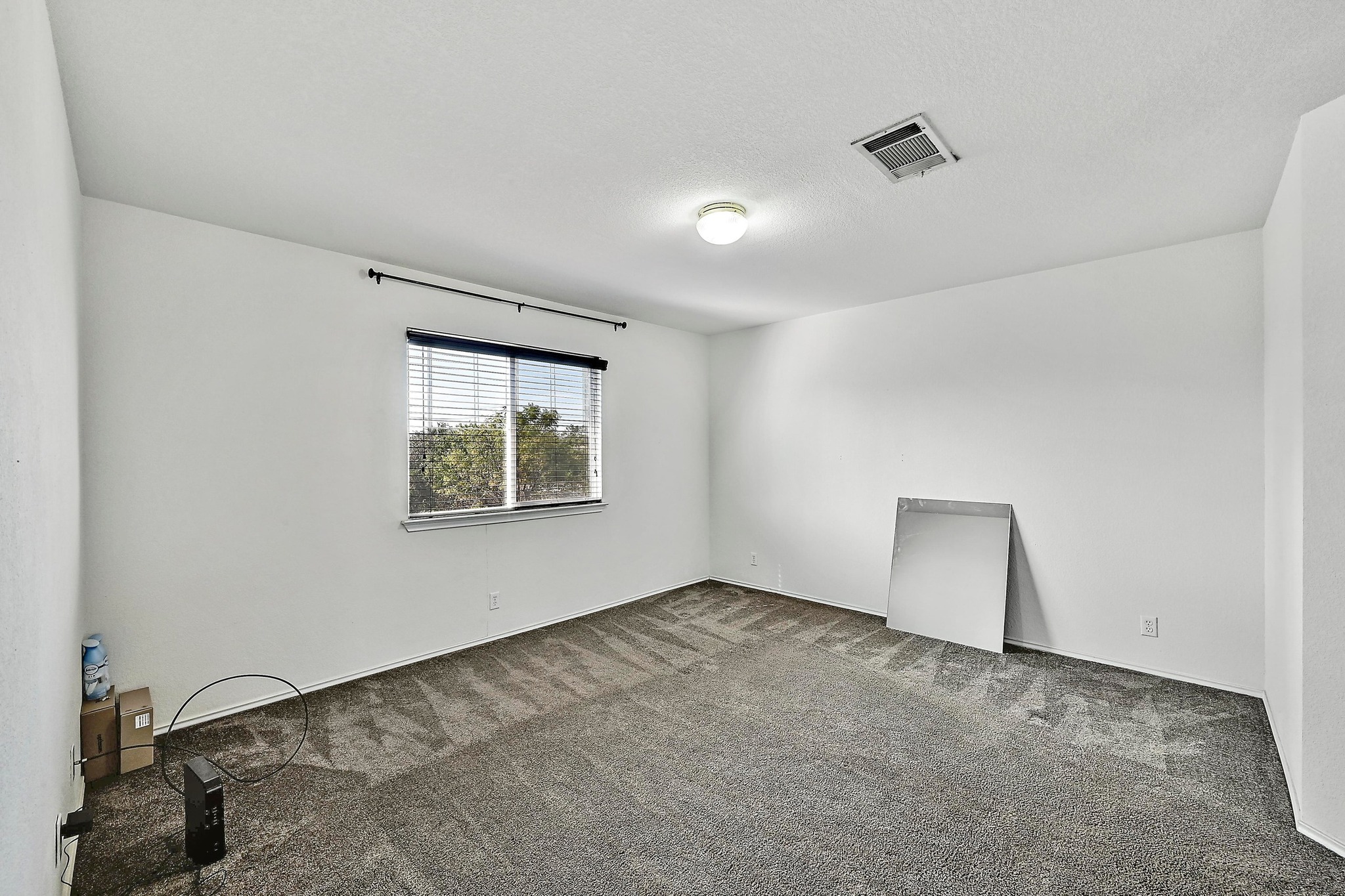 102 Cannery Cove Leander, TX 78641 - Photo 18 of 37 an empty room with a window