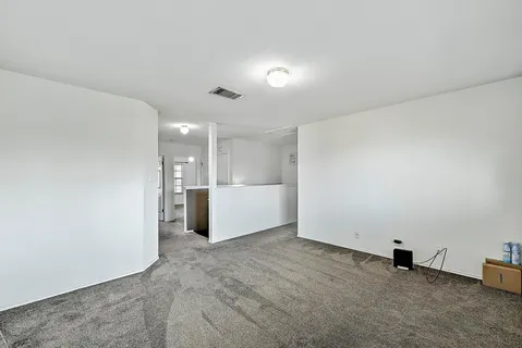 a view of a kitchen with a sink
