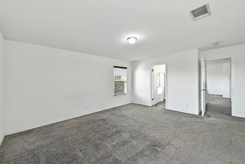 an empty room with a natural light