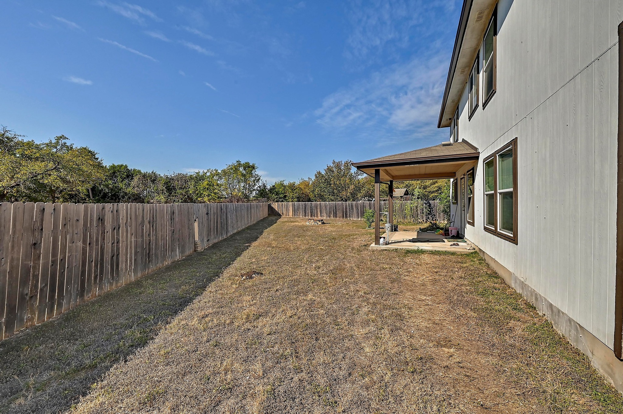 102 Cannery Cove Leander, TX 78641 - Photo 34 of 37 a view of a backyard with pathway