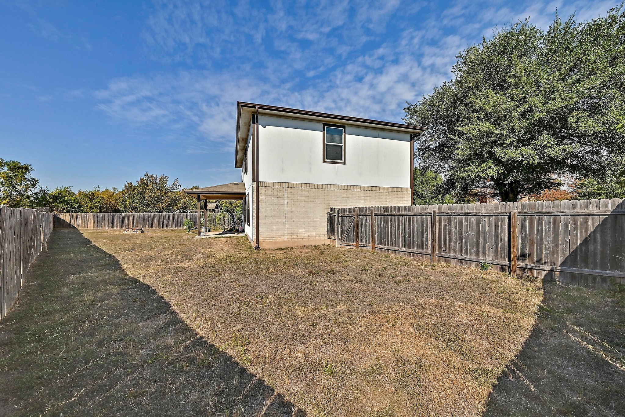 102 Cannery Cove Leander, TX 78641 - Photo 35 of 37 a view of a house with a backyard