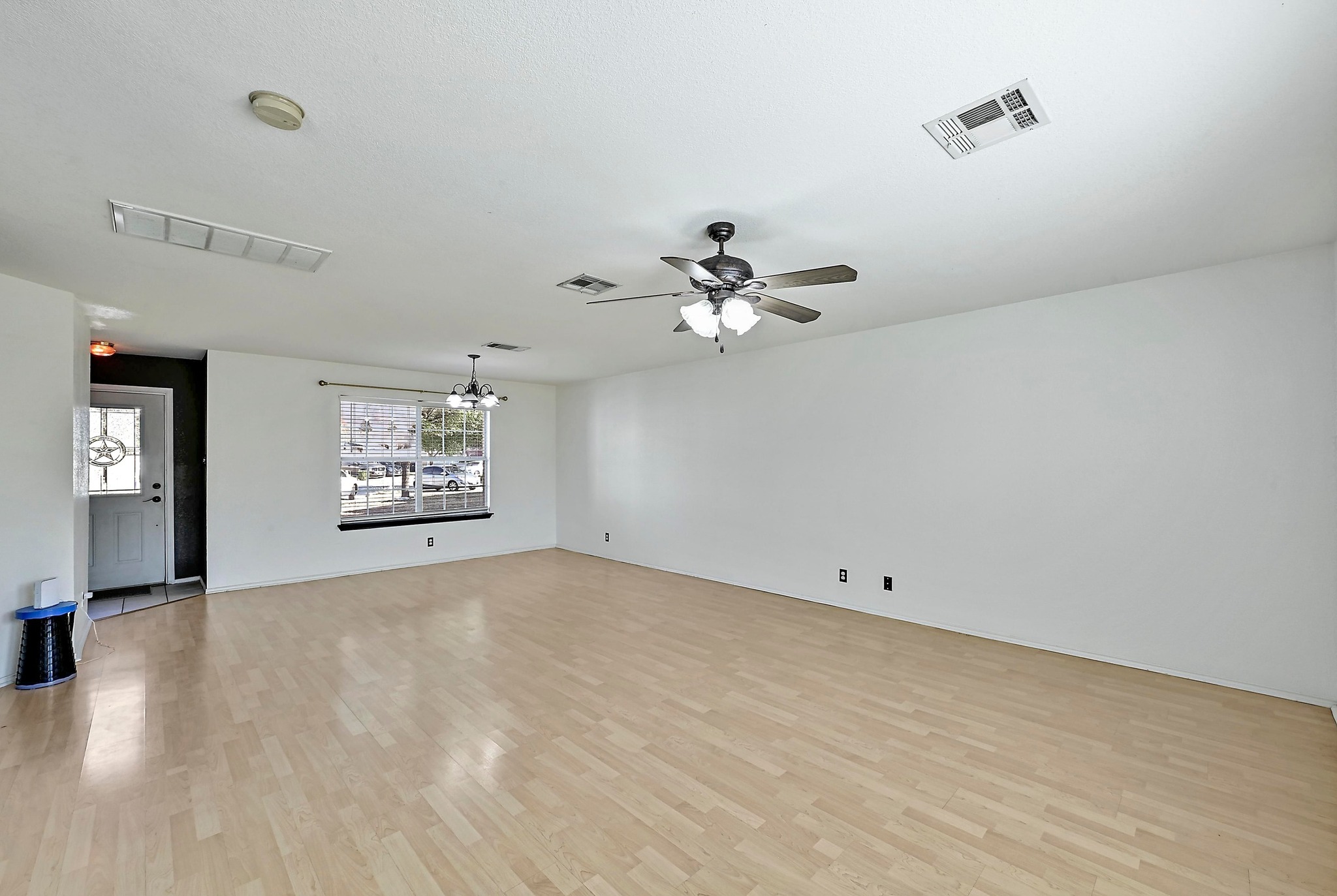 102 Cannery Cove Leander, TX 78641 - Photo 7 of 37 wooden floor in an empty room