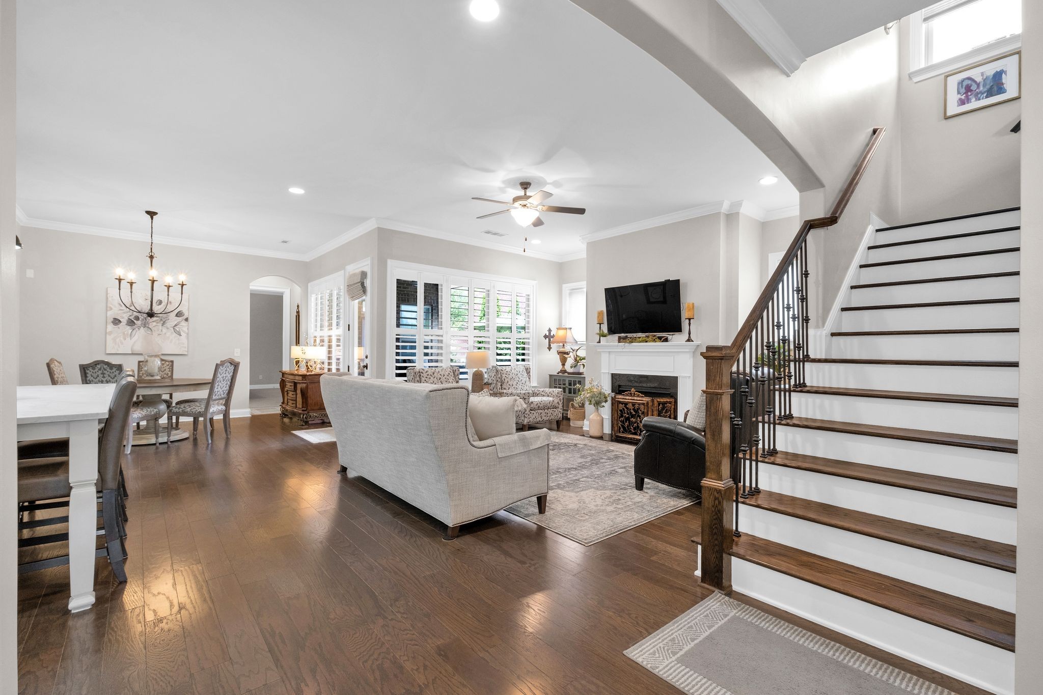 2505 Upper Hollow Road Thompson's Station, TN 37179 - Photo 11 of 52 a living room with furniture and a chandelier