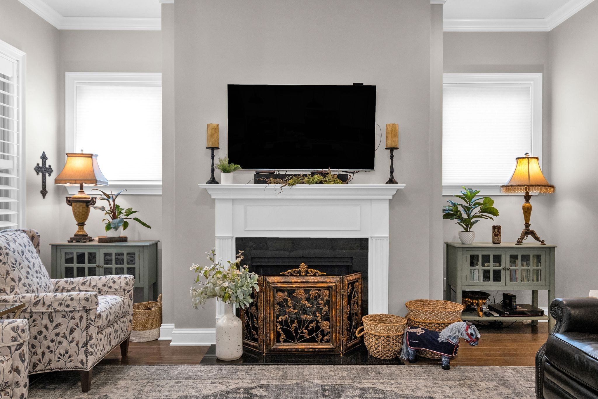 2505 Upper Hollow Road Thompson's Station, TN 37179 - Photo 13 of 52 a living room with furniture a flat screen tv and a fireplace