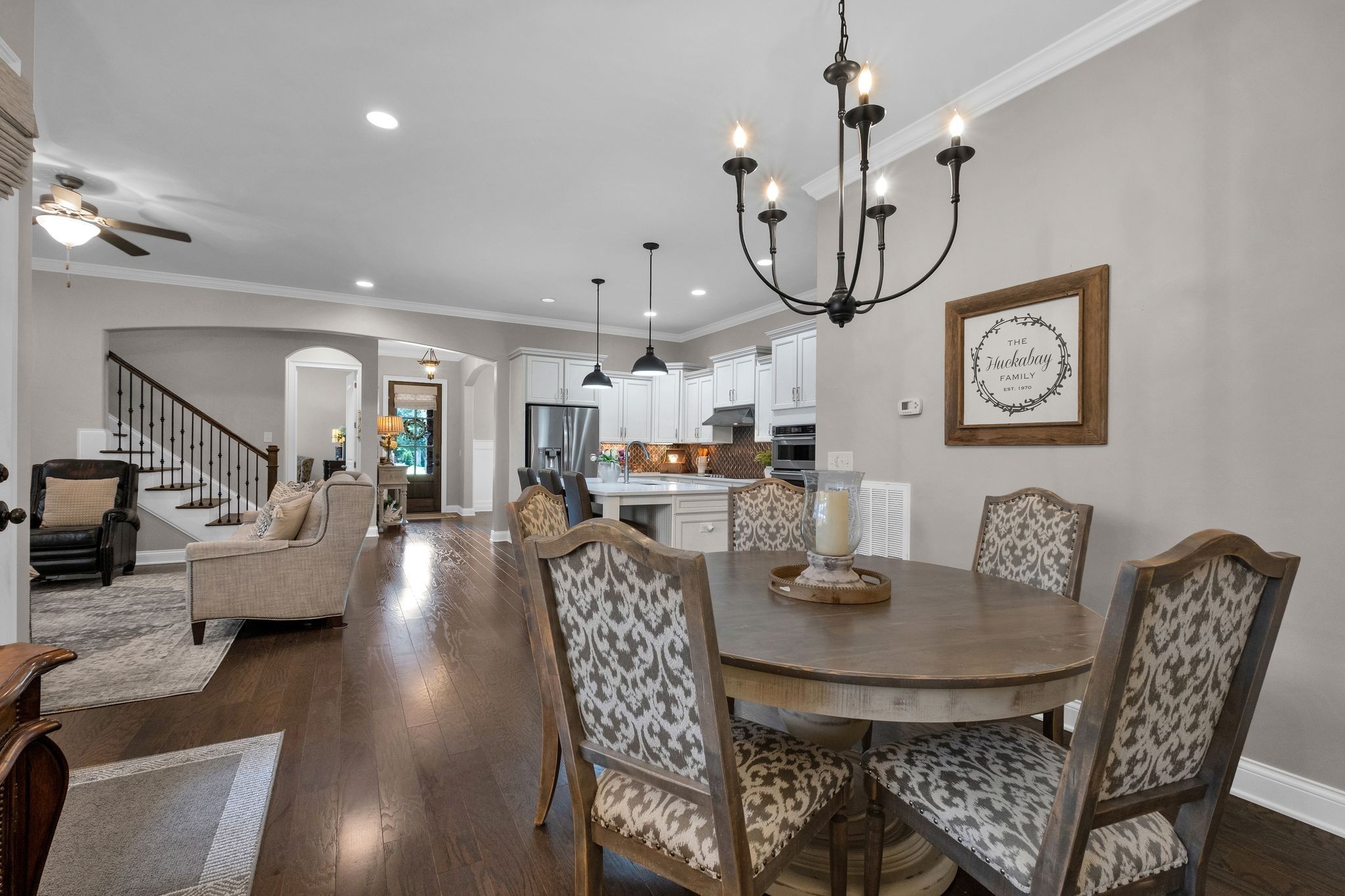 2505 Upper Hollow Road Thompson's Station, TN 37179 - Photo 20 of 52 a view of a dining room with furniture and wooden floor