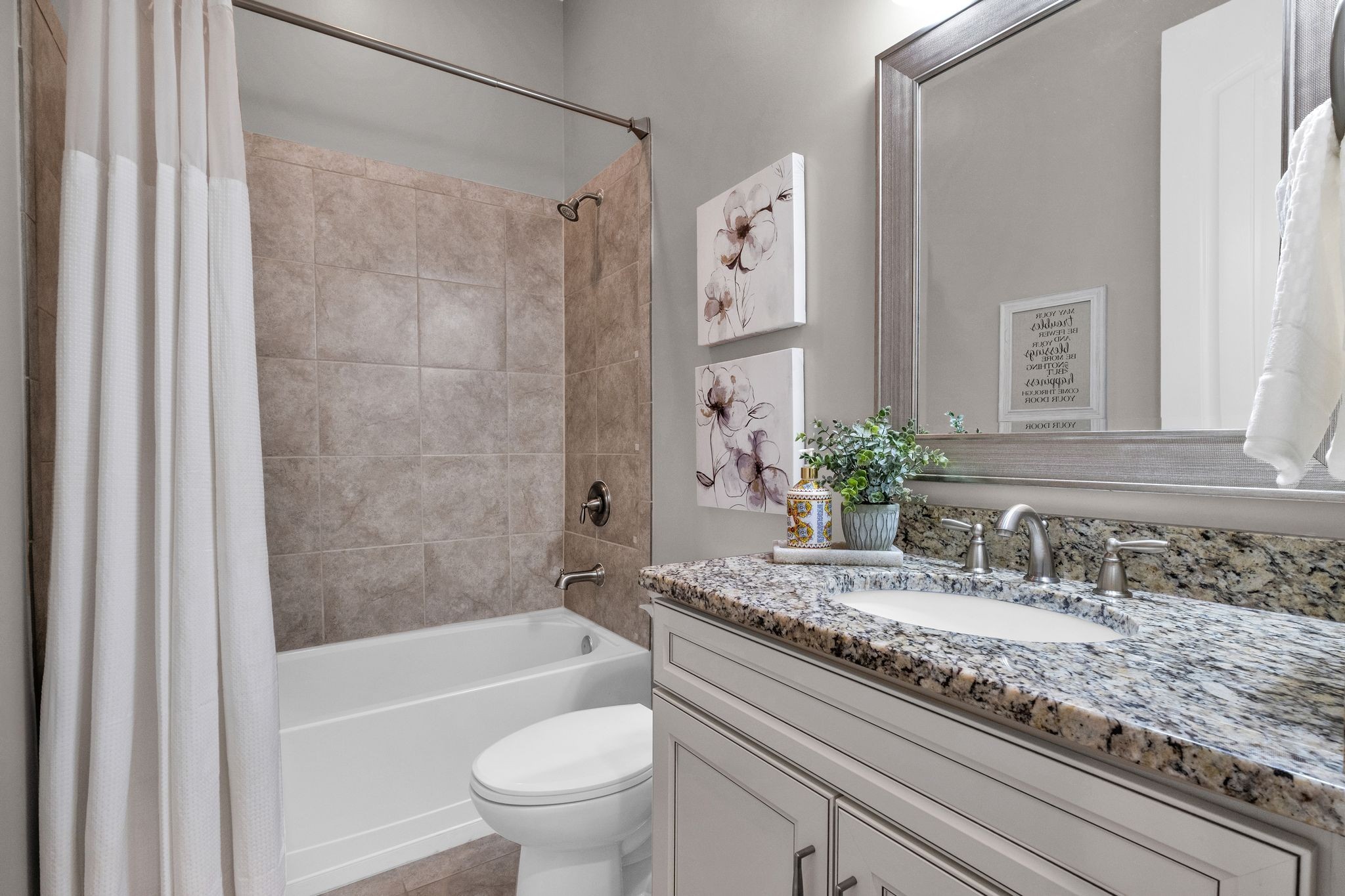 2505 Upper Hollow Road Thompson's Station, TN 37179 - Photo 31 of 52 a bathroom with a granite countertop sink a toilet and shower
