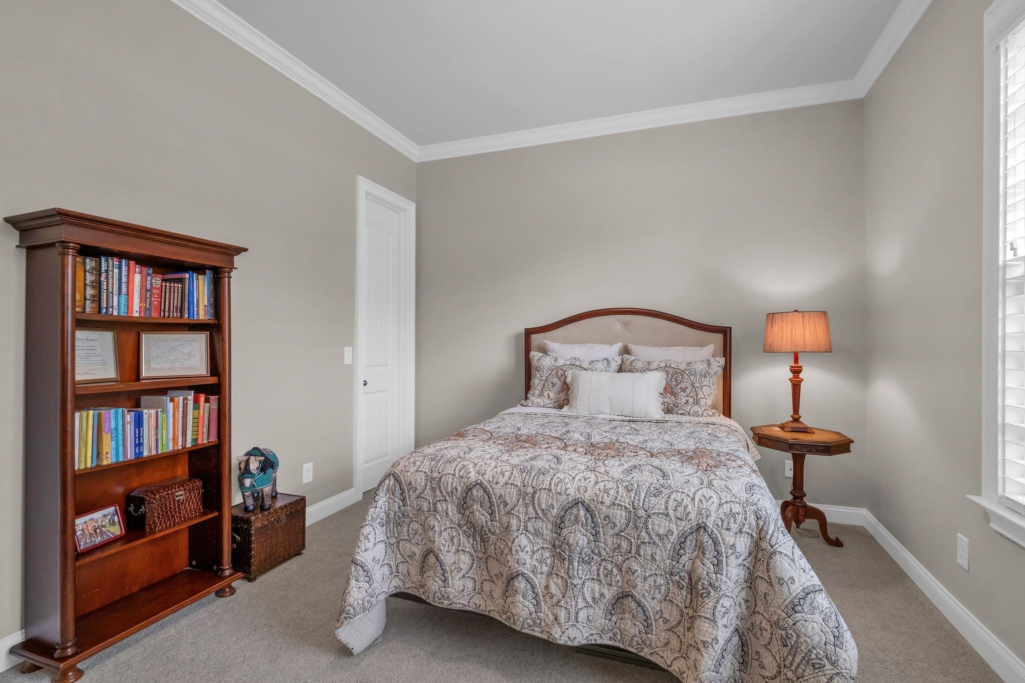 2505 Upper Hollow Road Thompson's Station, TN 37179 - Photo 33 of 52 a bedroom with a bed and a book shelf