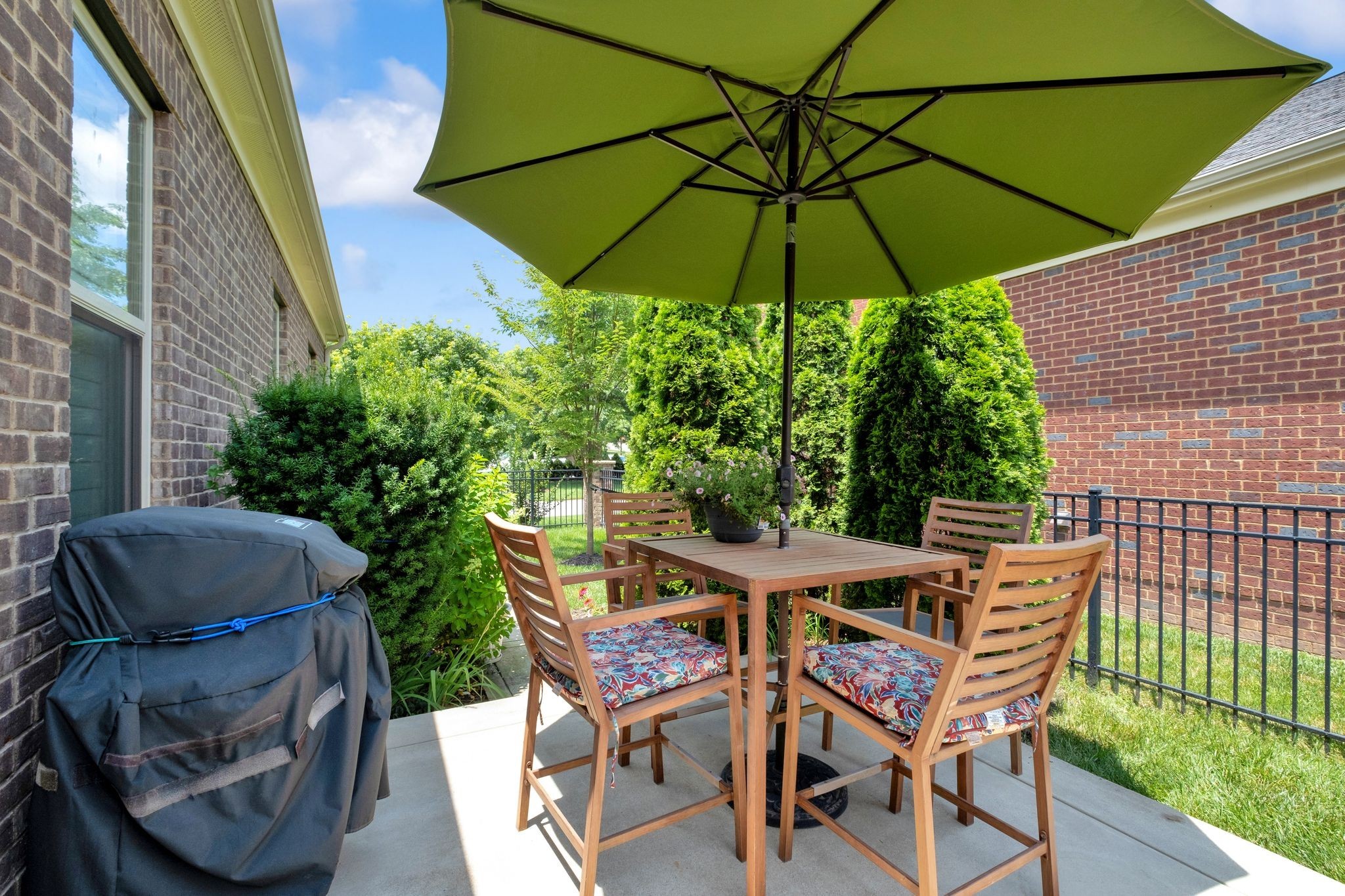 2505 Upper Hollow Road Thompson's Station, TN 37179 - Photo 42 of 52 a patio with a patio table and chairs