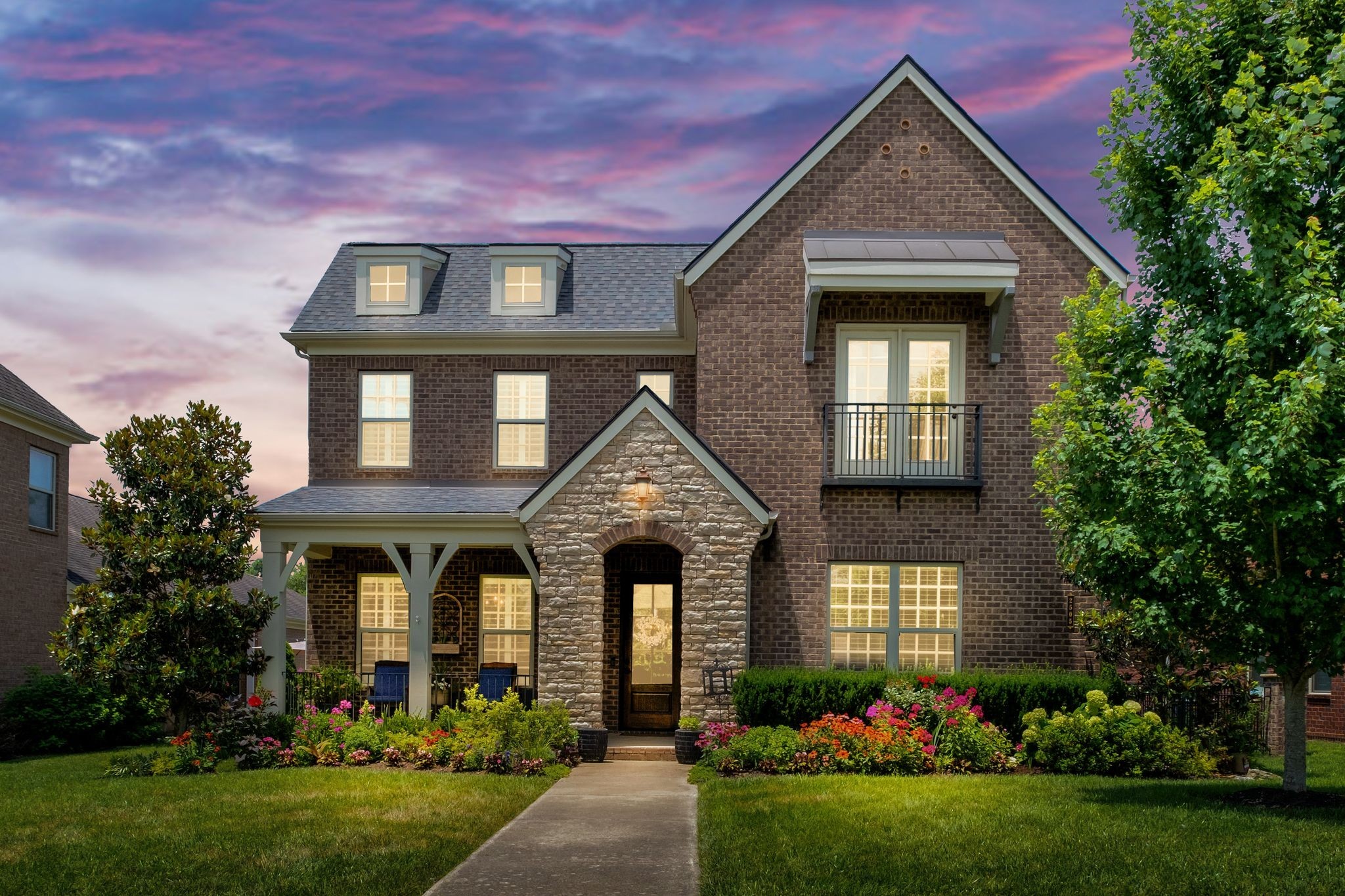 2505 Upper Hollow Road Thompson's Station, TN 37179 - Photo 6 of 52 a front view of a house with a yard