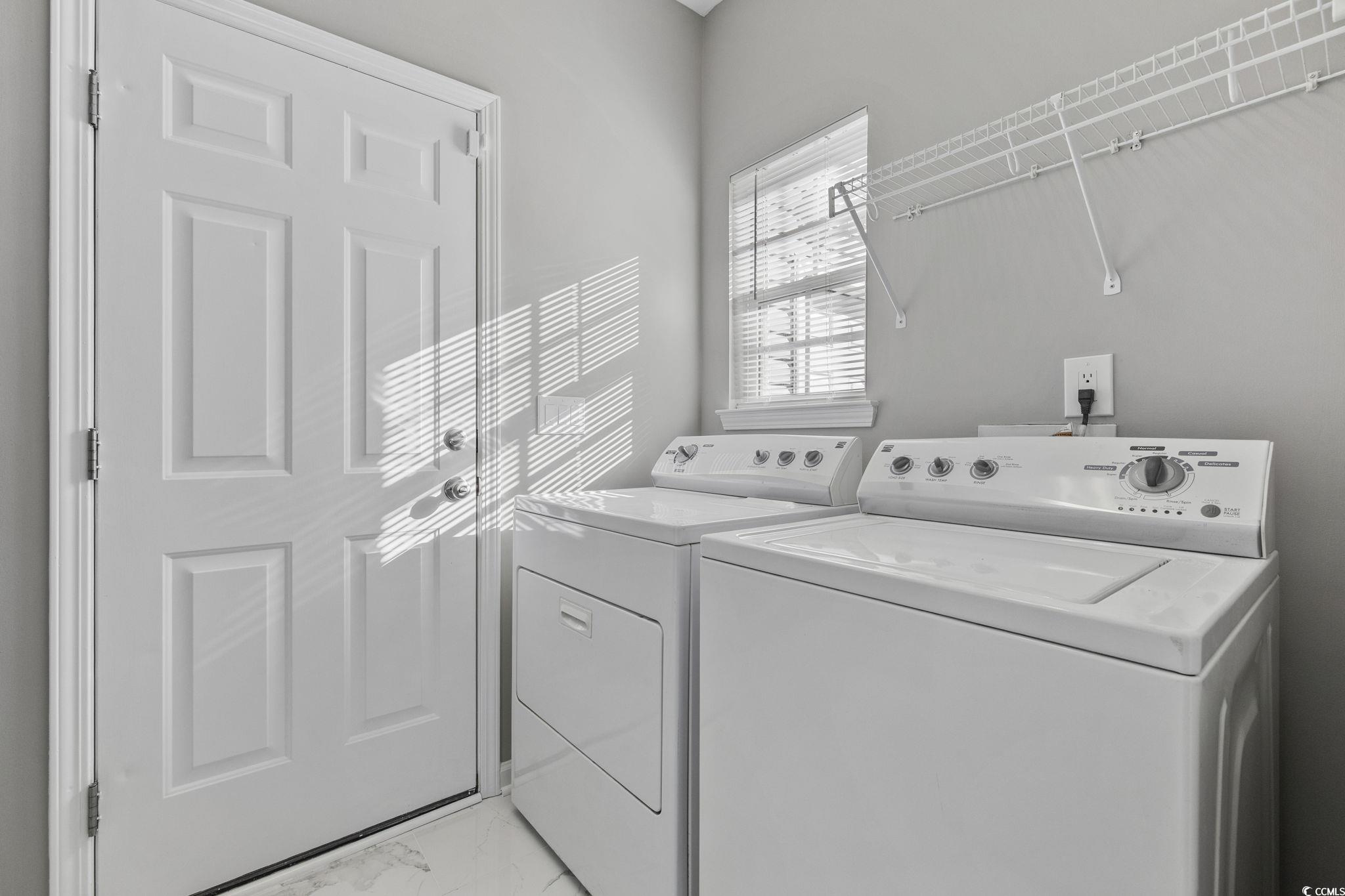 629 Slash Pine Court Myrtle Beach, SC 29579 - Photo 29 of 40 Washroom with washing machine and dryer and light marble finish floors
