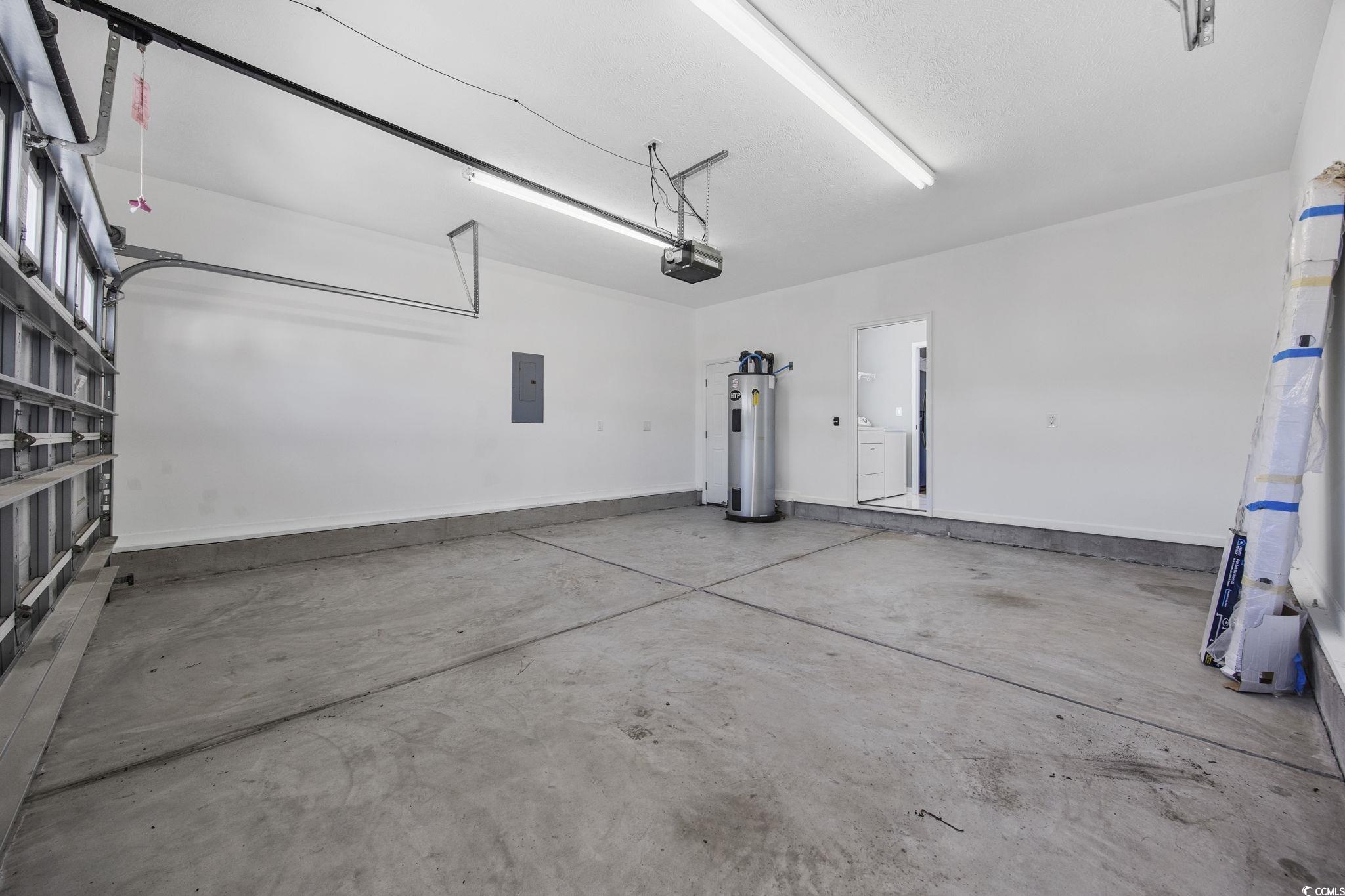 629 Slash Pine Court Myrtle Beach, SC 29579 - Photo 30 of 40 Garage with electric water heater and electric panel