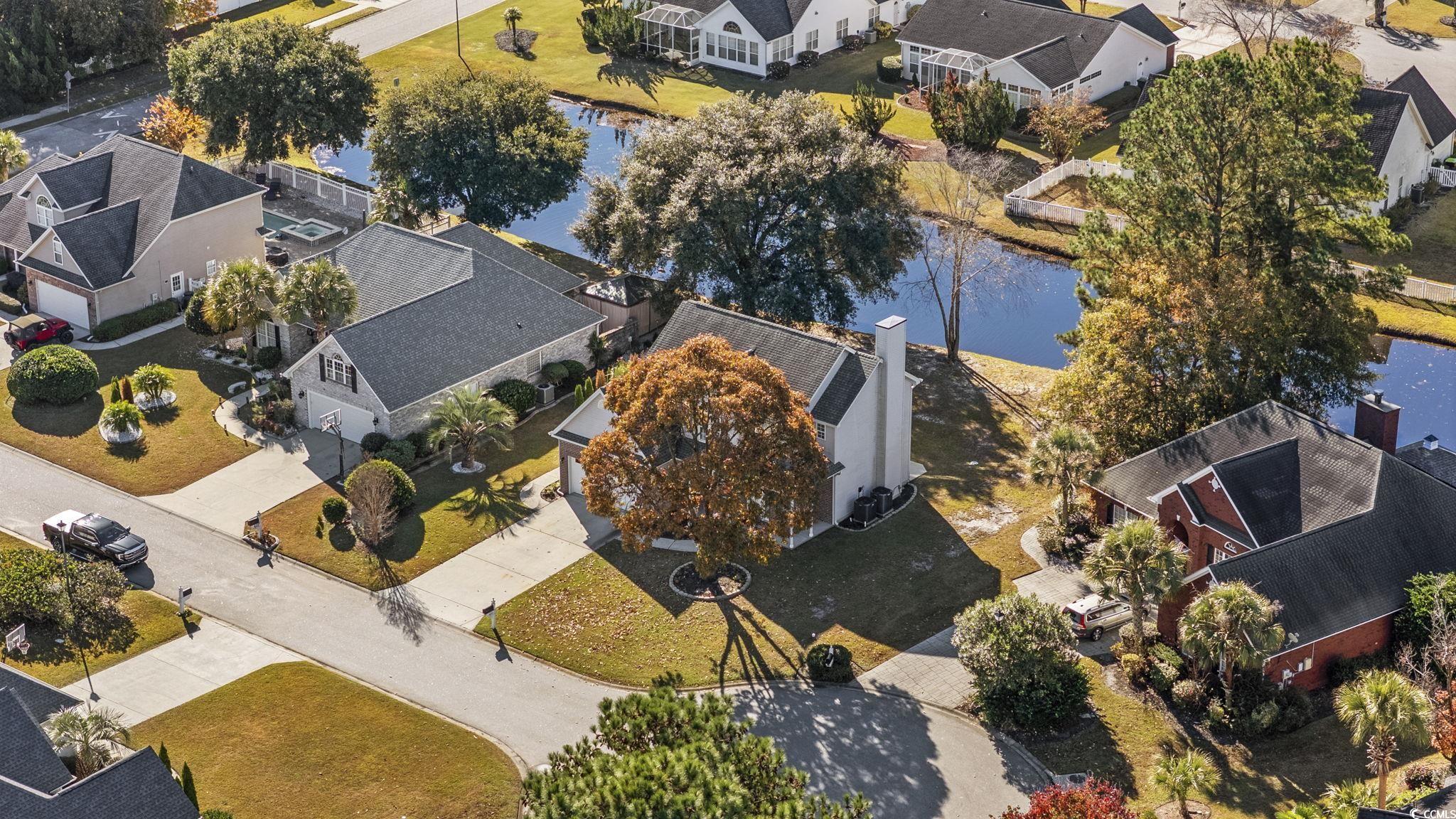 629 Slash Pine Court Myrtle Beach, SC 29579 - Photo 34 of 40 Aerial view of residential area with a nearby body of water