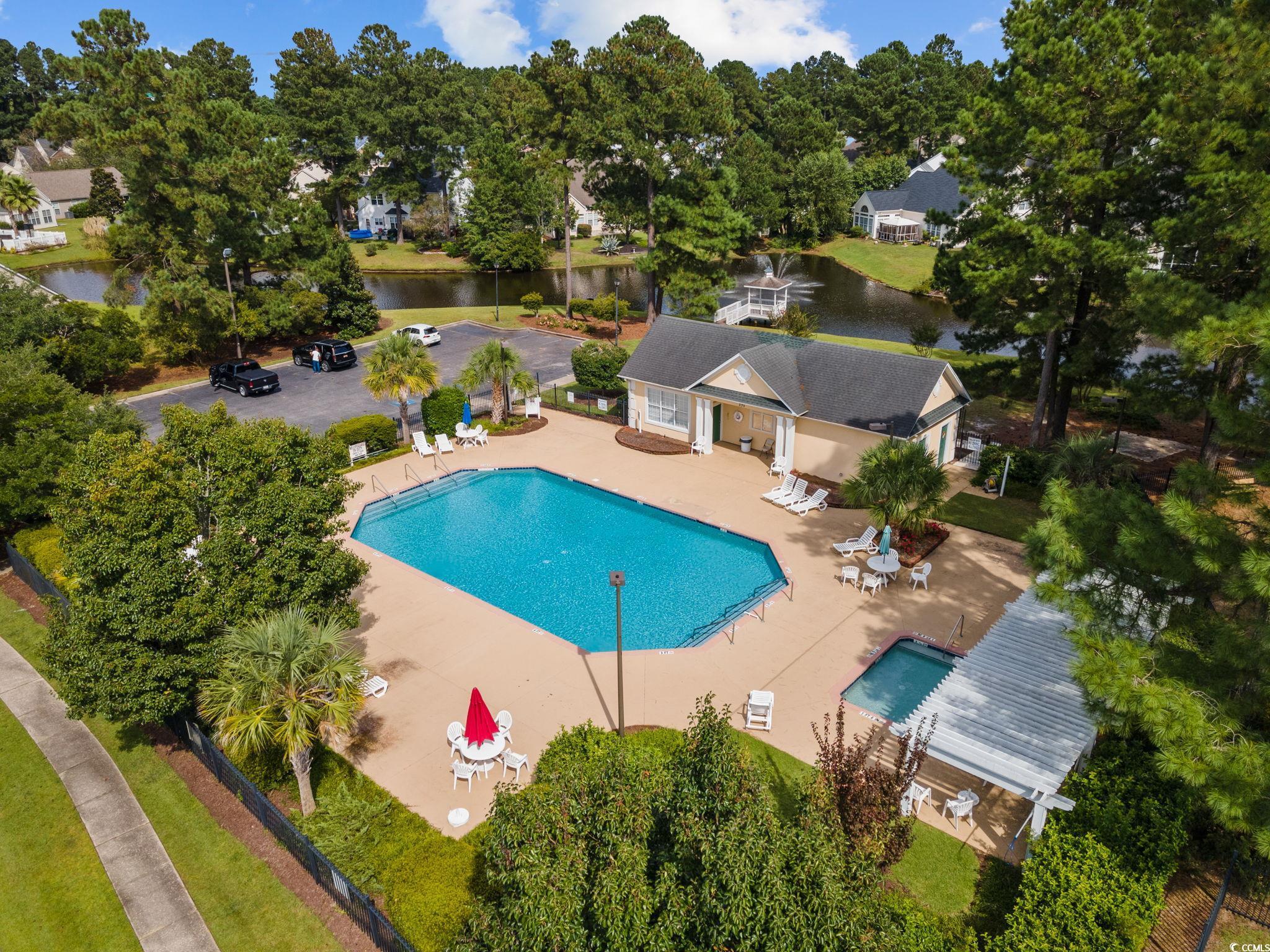 629 Slash Pine Court Myrtle Beach, SC 29579 - Photo 37 of 40 Community pool with a patio and a water view