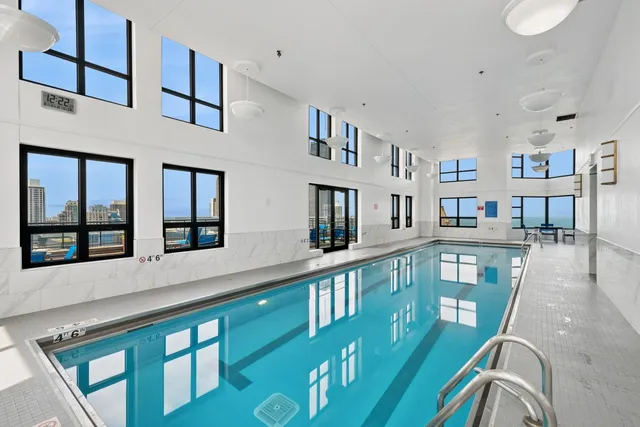 a view of a living room and dining room