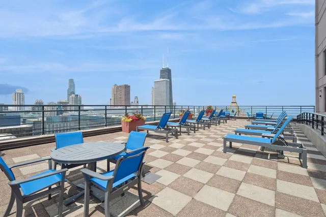 a view of a terrace with sitting area