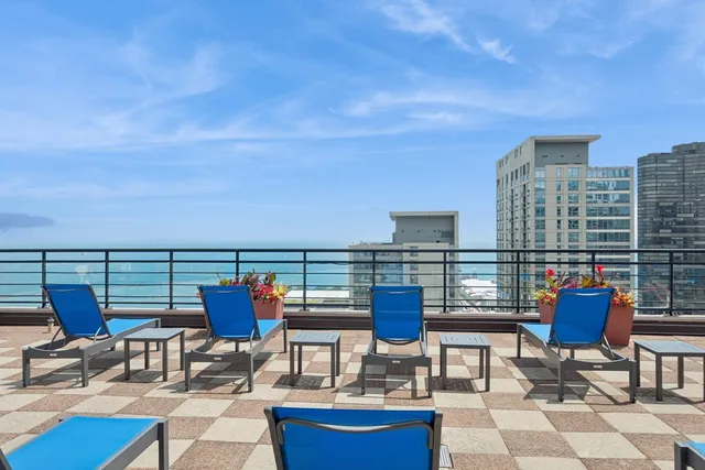 a view of roof deck with seating space