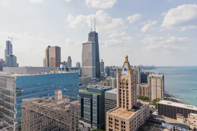a view of a city with tall buildings