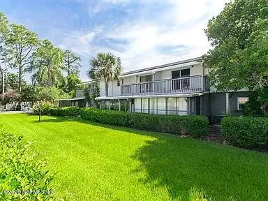 a car parked in front of a house