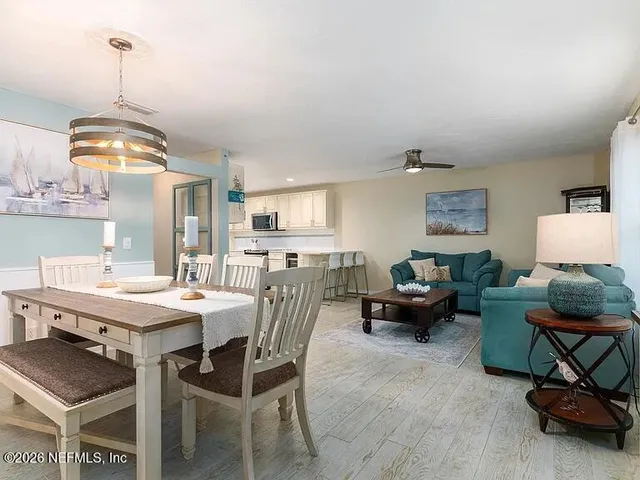 a view of a dining room with furniture