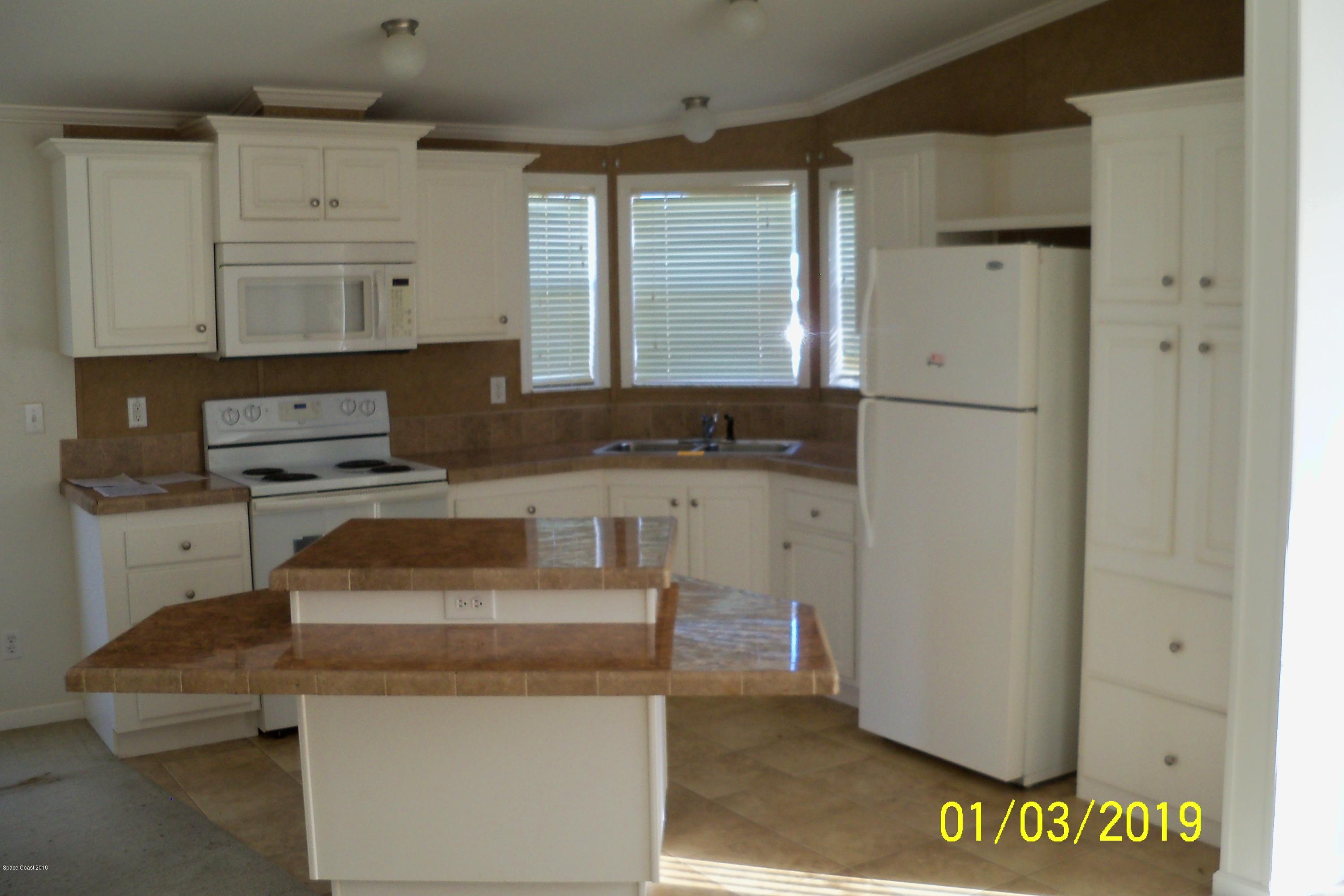 1972 Seagrape Street Northeast Palm Bay, FL 32905 - Photo 5 of 7 101_1007