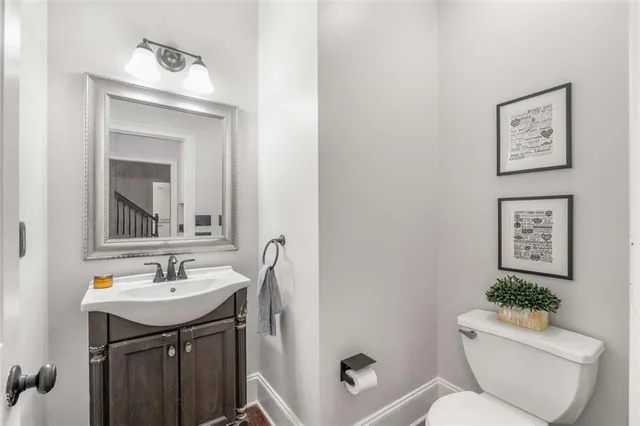 a view of an entryway with wooden floor and windows
