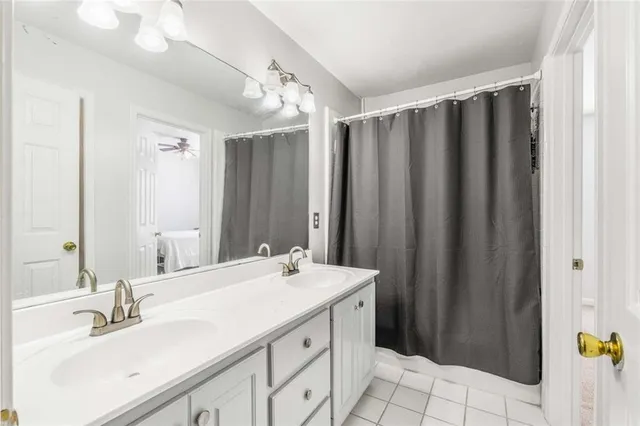 a view of an empty room with a kitchen