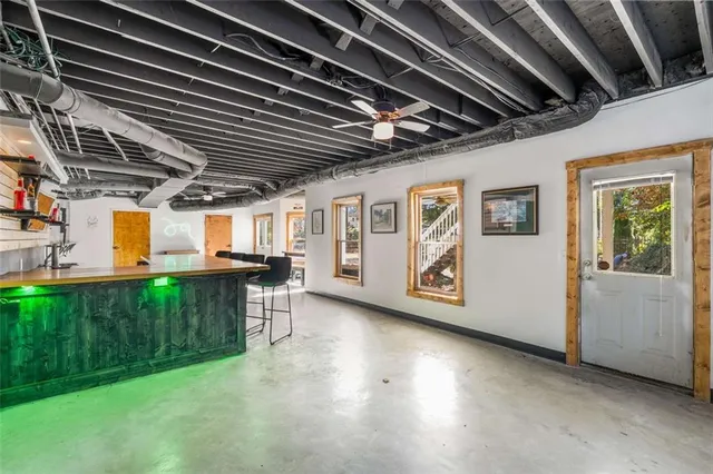 an aerial view of a house with swimming pool