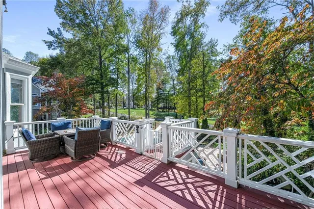 an aerial view of a house with a yard and garden