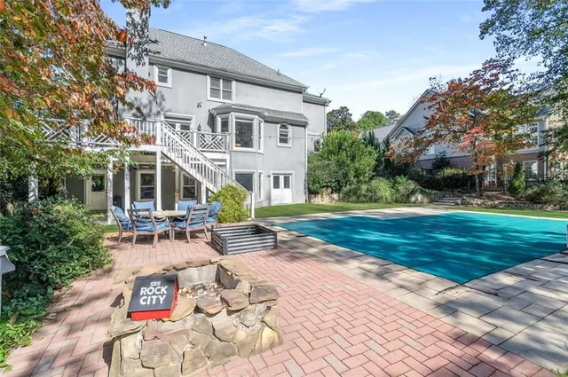 an aerial view of a houses with a yard