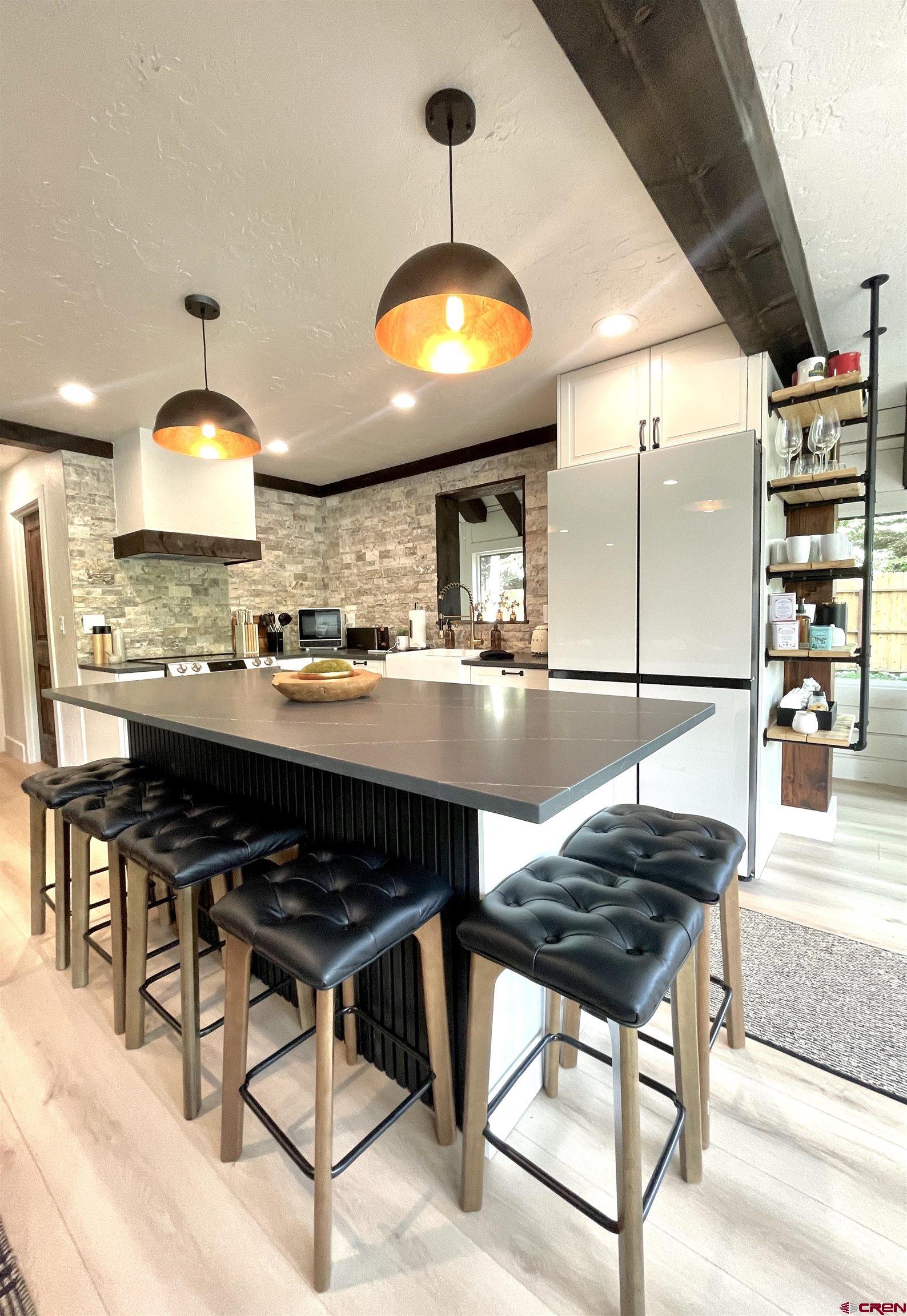 170 Lower Allen Road Crested Butte, CO 81224 - Photo 10 of 42 a kitchen with a table and chairs