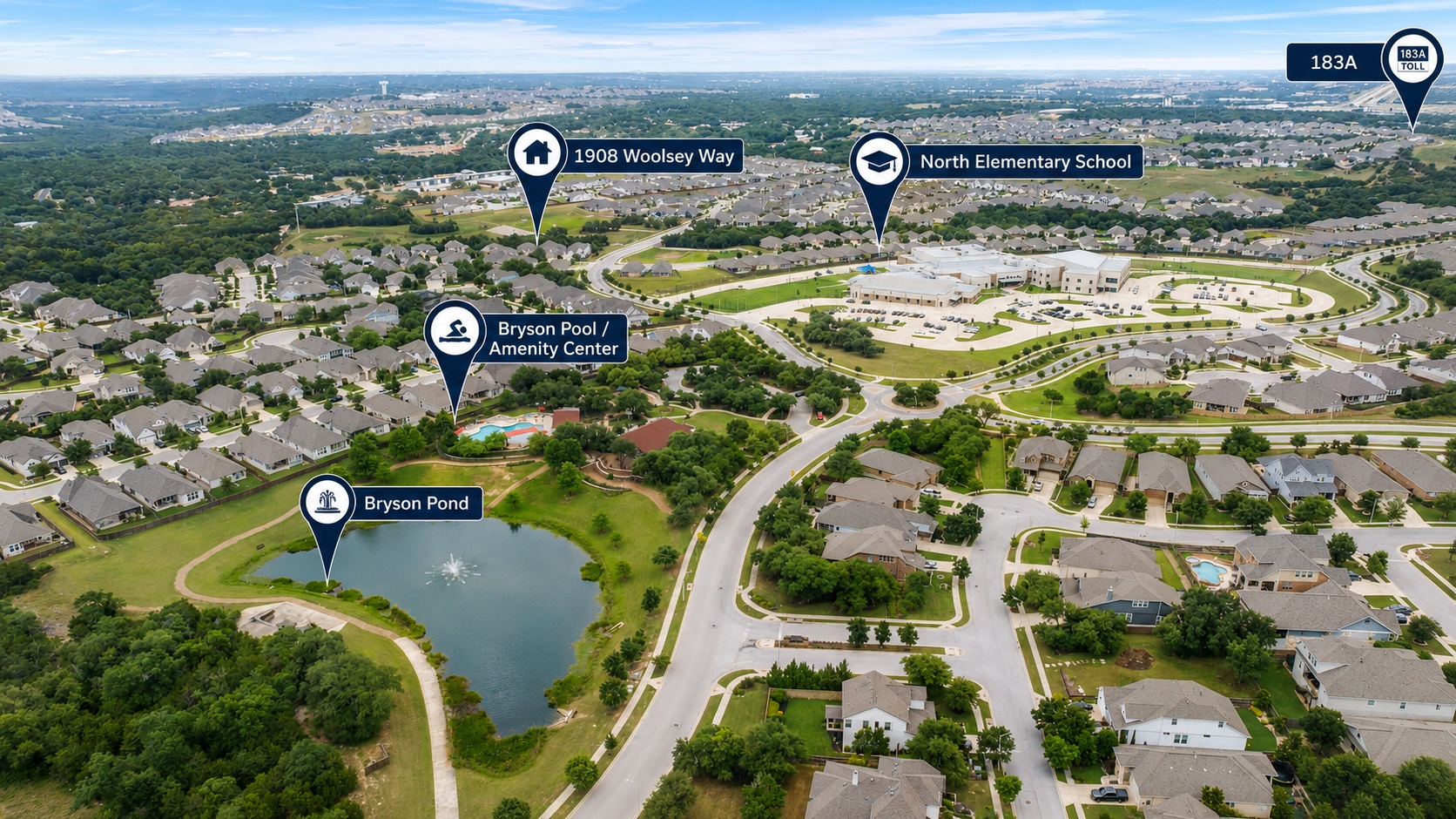 1908 Woolsey Way Leander, TX 78641 - Photo 34 of 36 An aerial perspective reveals a vibrant neighborhood, complete with a serene pond and convenient community amenities.