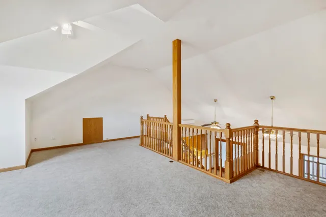 a view of a room with white walls