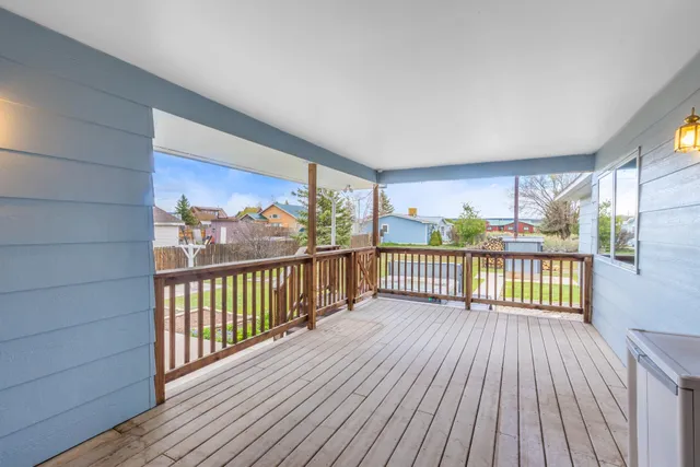 a view of a backyard with sitting area