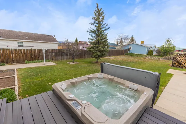 a view of a swimming pool with a lake view