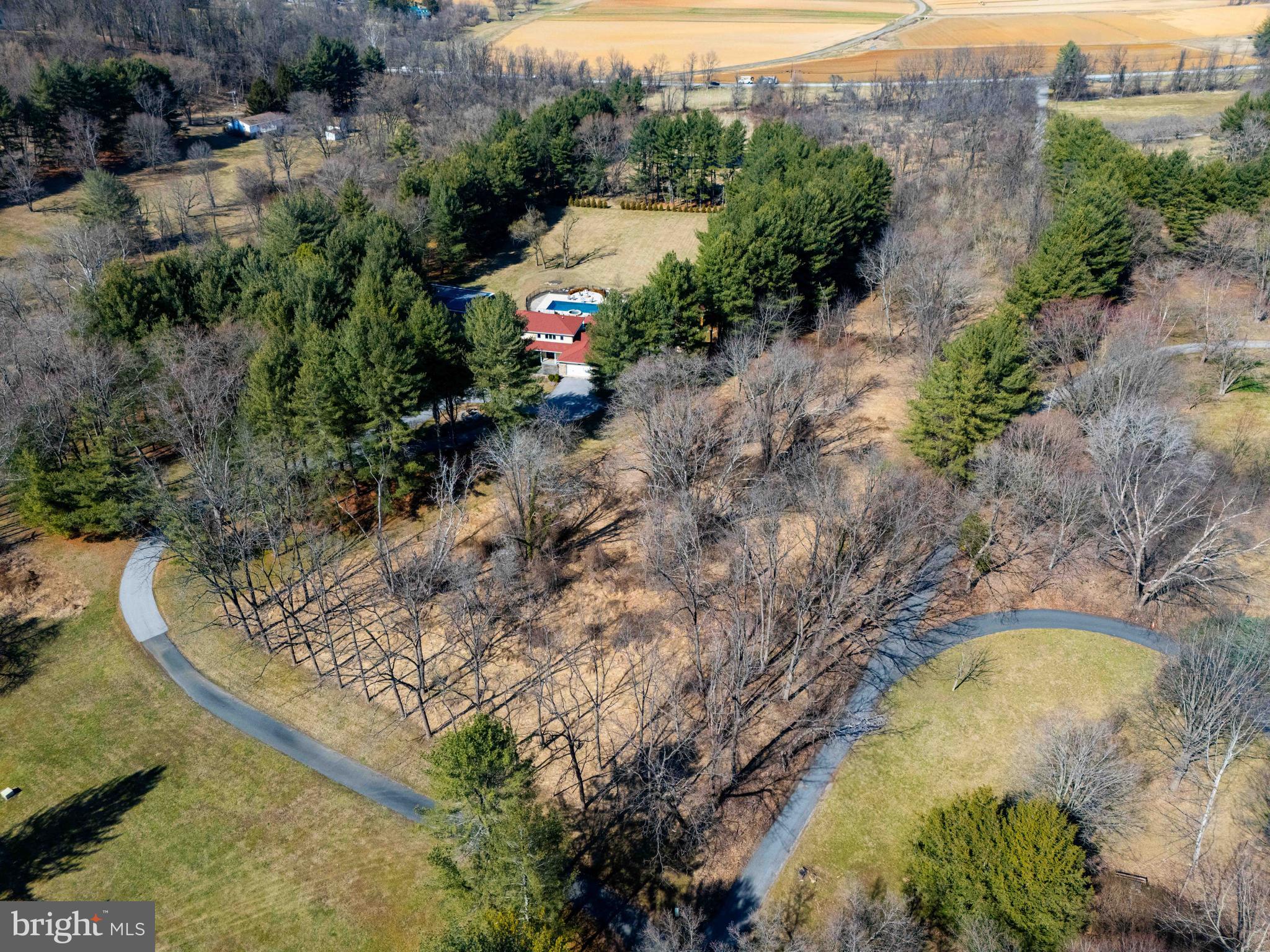6031 Glen Arm Road East Glen Arm, MD 21057 - Photo 5 of 18 a view of a swimming pool with a yard