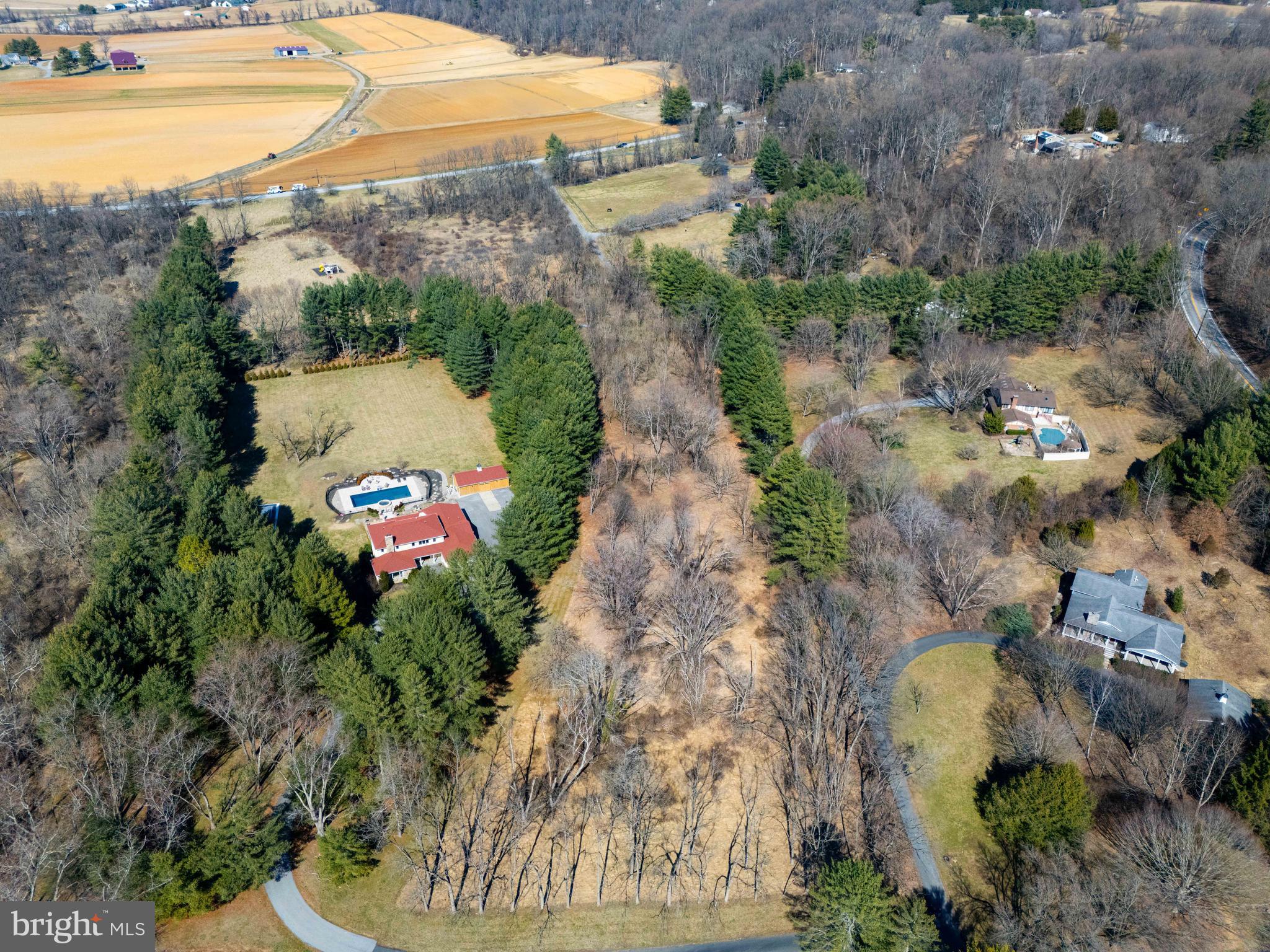6031 Glen Arm Road East Glen Arm, MD 21057 - Photo 6 of 18 an aerial view of a house with a yard and lake view