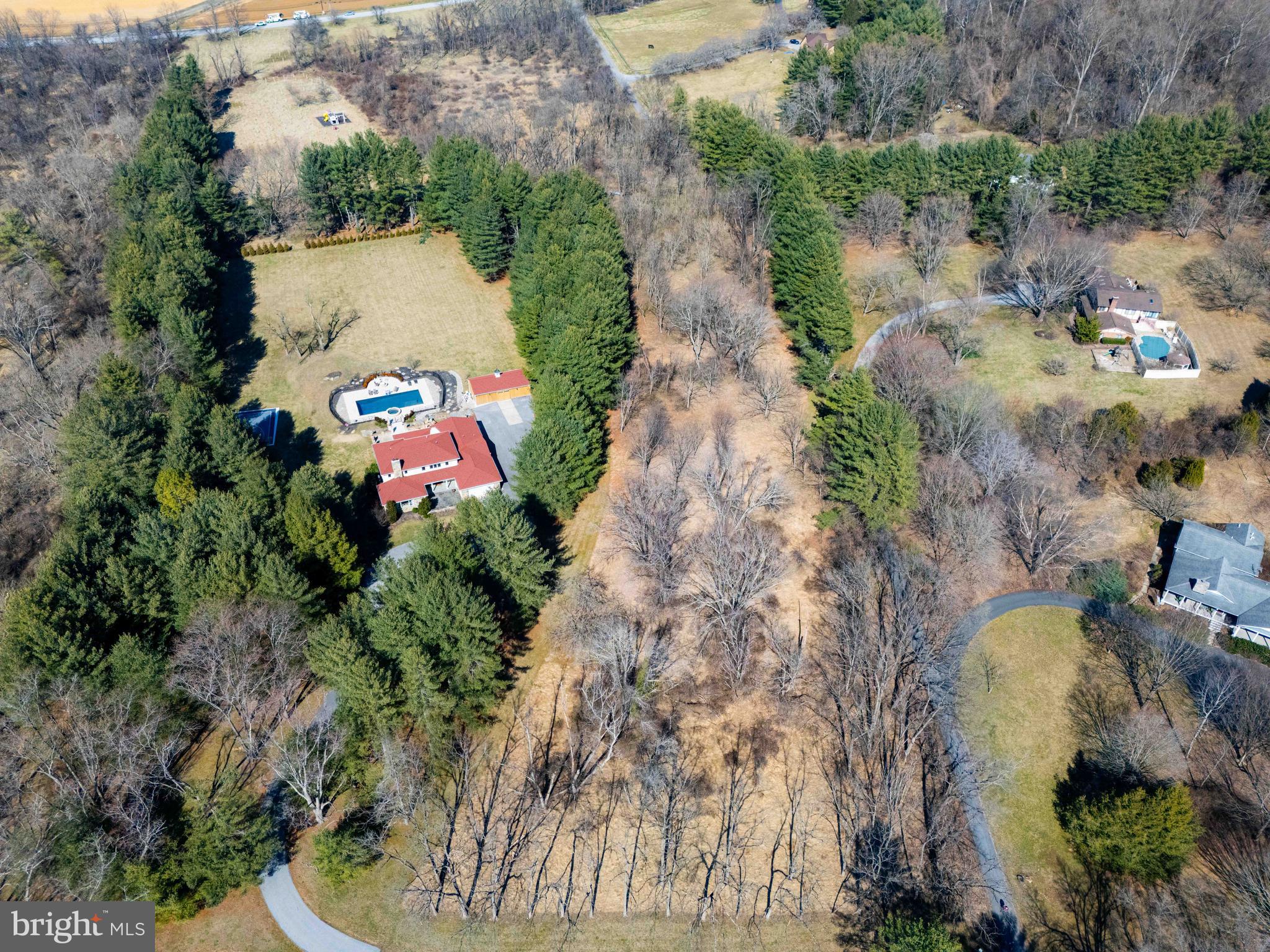 6031 Glen Arm Road East Glen Arm, MD 21057 - Photo 7 of 18 an aerial view of a house with a yard and garden