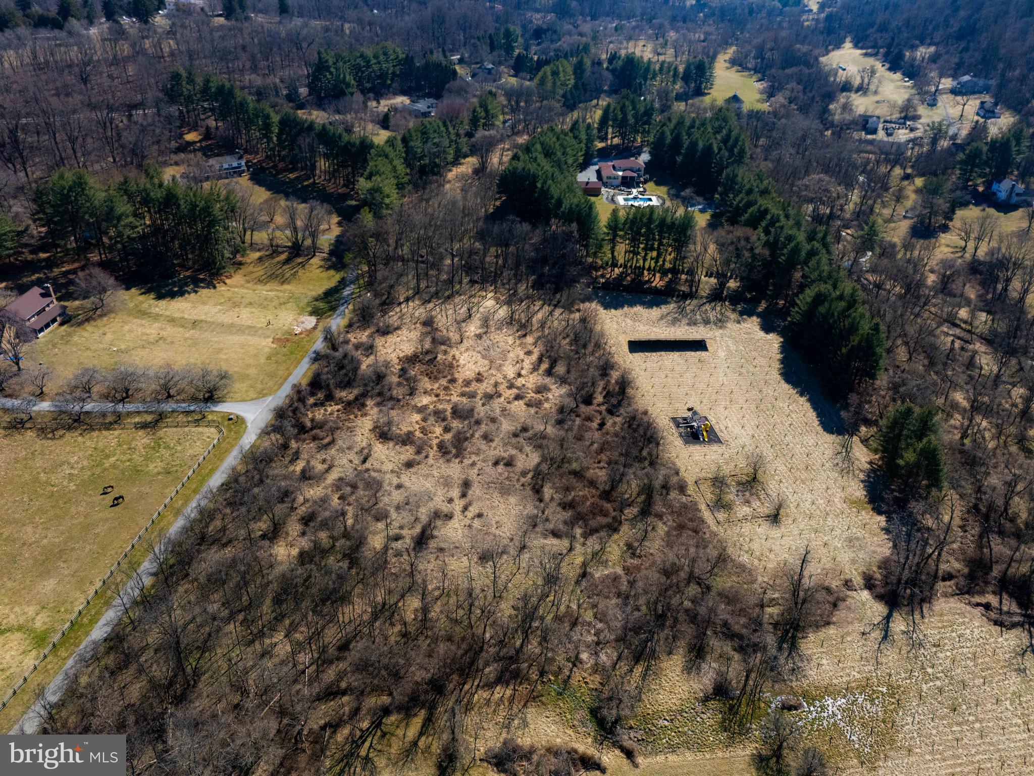 6031 Glen Arm Road East Glen Arm, MD 21057 - Photo 10 of 18 a view of a yard with wooden fence