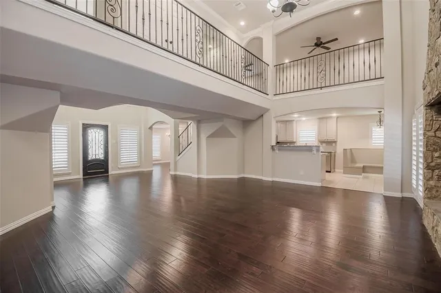 a view of an entryway with wooden floor