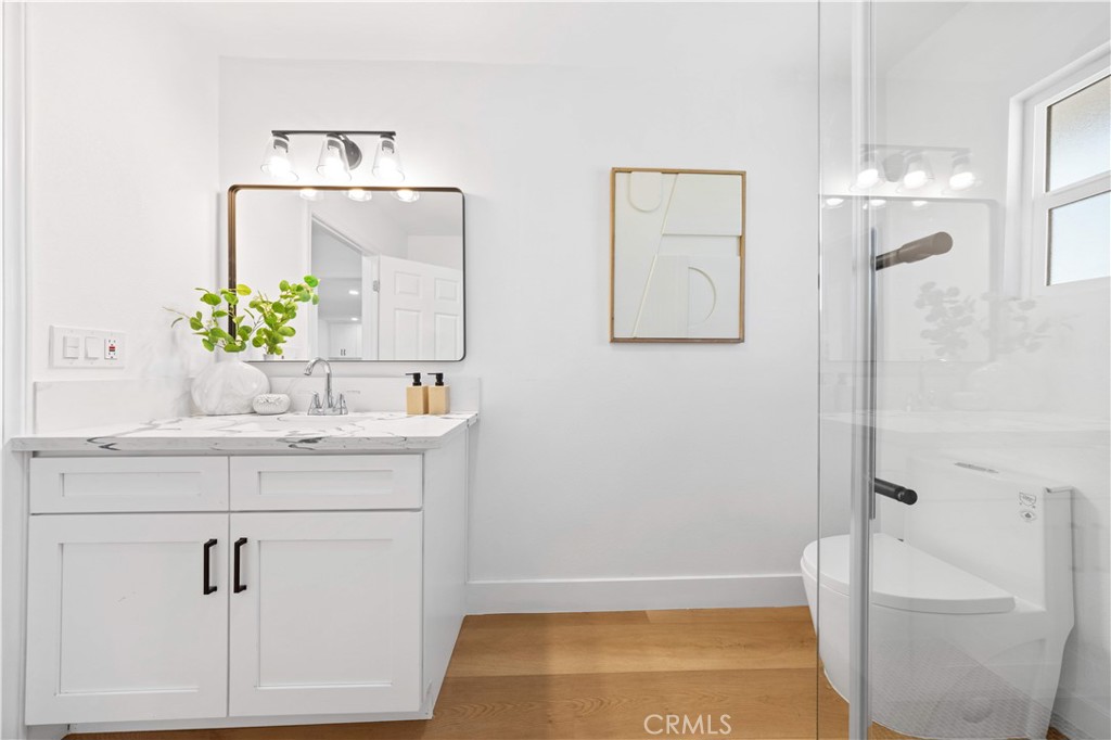 2274 Cogswell Road El Monte, CA 91732 - Photo 14 of 26 a bathroom with a sink and a mirror