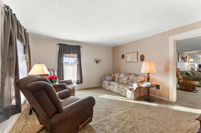 a living room with furniture and a couch