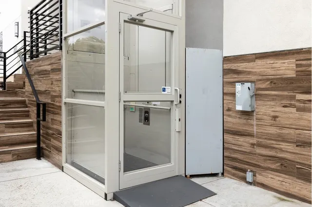 a bathroom with a shower and closet