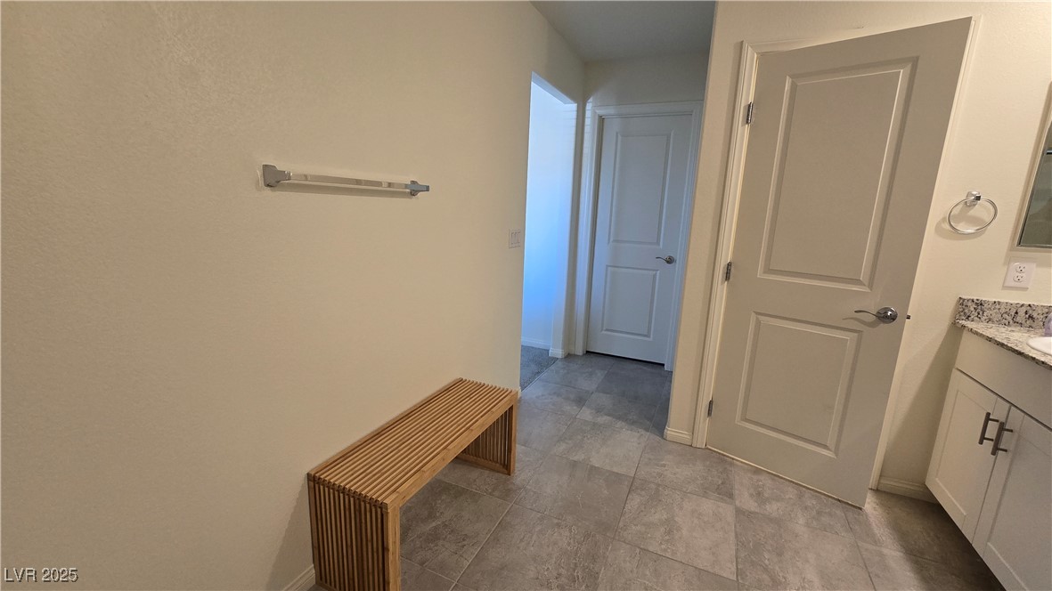 10971 Meridian Fields Avenue Las Vegas, NV 89166 - Photo 37 of 66 Corridor featuring baseboards