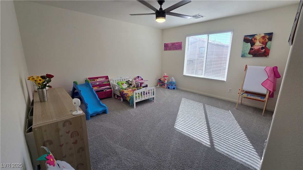 10971 Meridian Fields Avenue Las Vegas, NV 89166 - Photo 48 of 66 Rec room with carpet and ceiling fan