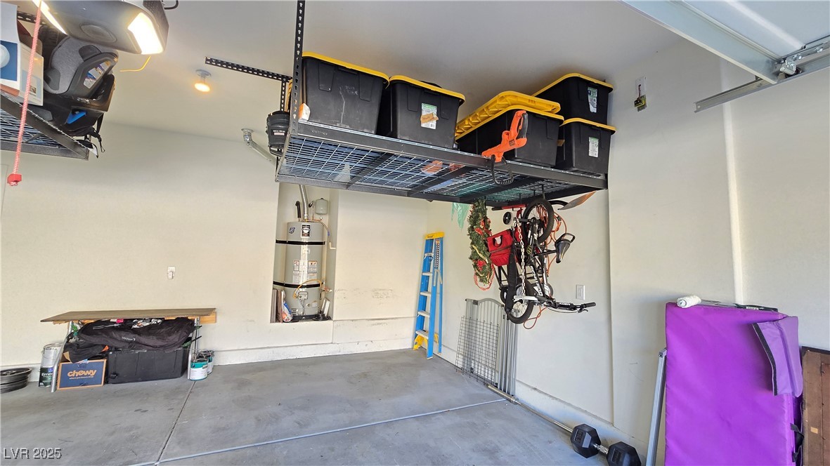 10971 Meridian Fields Avenue Las Vegas, NV 89166 - Photo 57 of 66 Garage featuring water heater