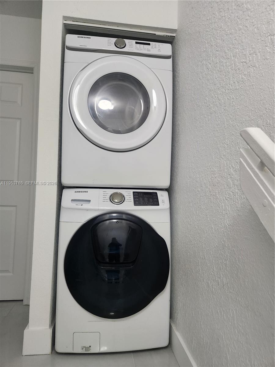 8025 Northwest 8th Street, Unit 10 Miami, FL 33126 - Photo 17 of 26 a close up view of washer and dryer
